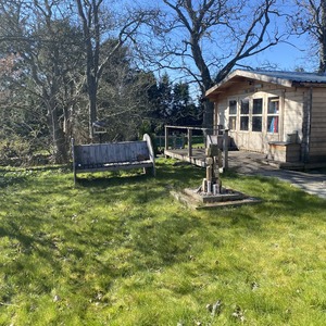 Proposed site - in front of woodwork cabin