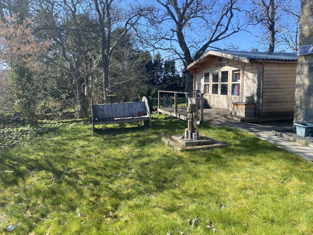 Proposed site - in front of woodwork cabin
